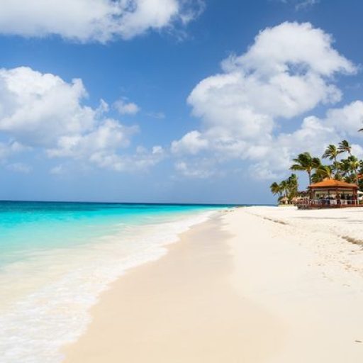Idyllic,Tropical,Beach,With,White,Sand,And,Turquoise,Ocean,Water